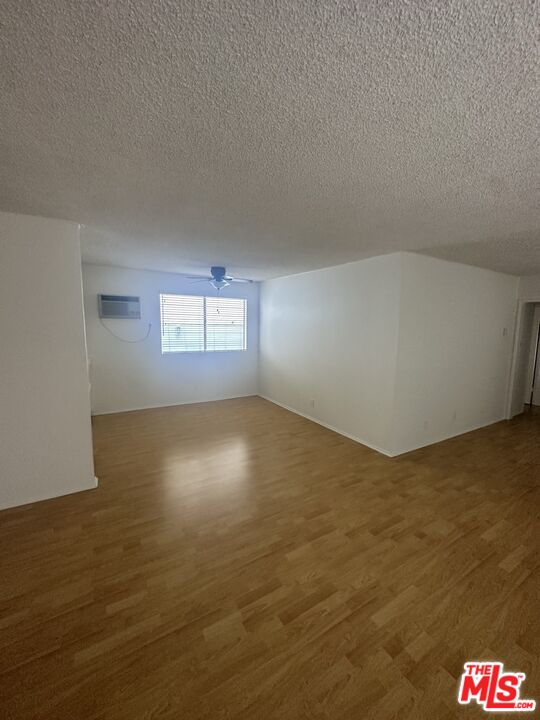 11525 Rochester Avenue, Unit 201 Los Angeles, CA 90025 - Photo 4 of 12 a view of an empty room and window