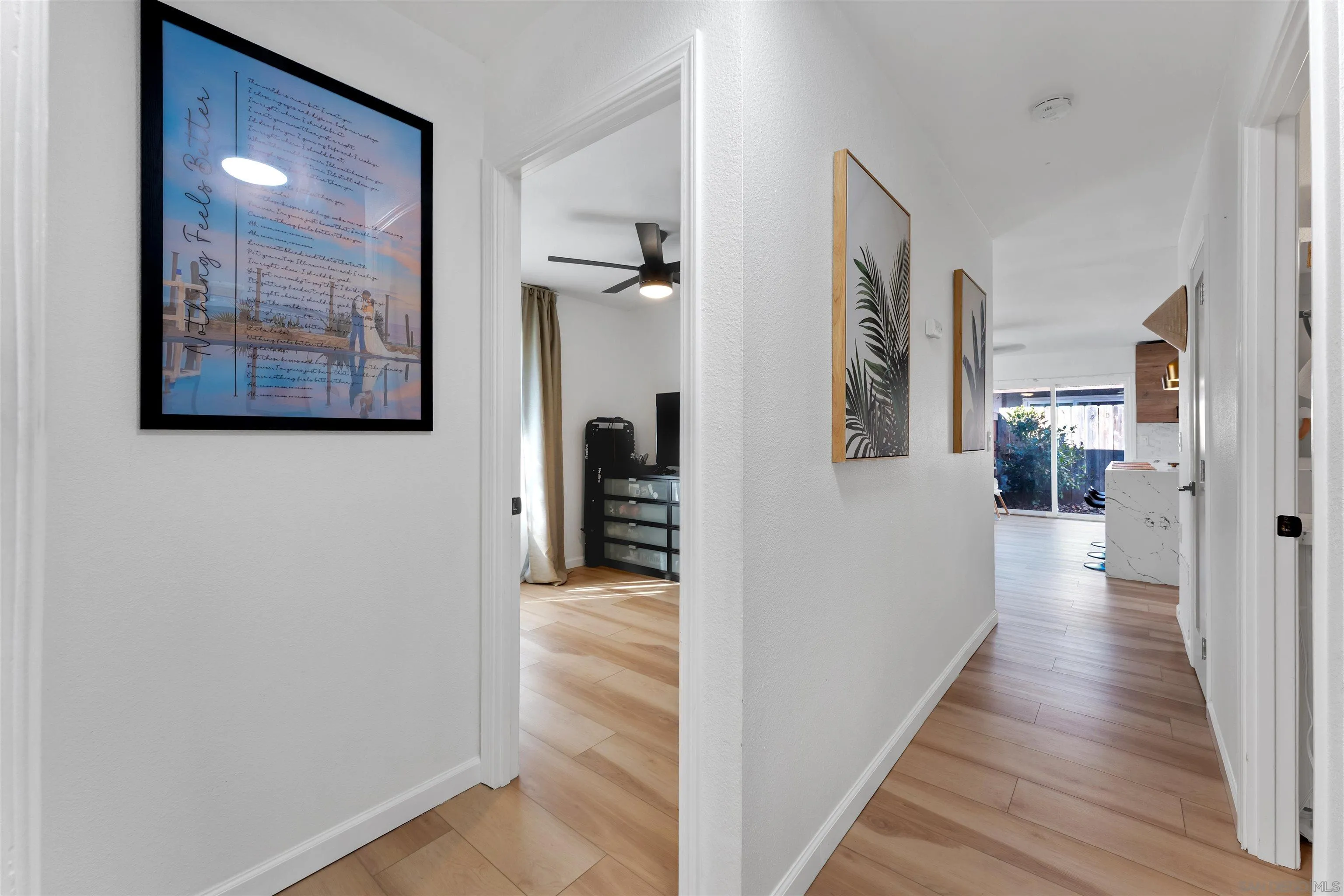 1622 Summertime Drive El Cajon, CA 92021 - Photo 21 of 27 a view of a hallway with wooden floor