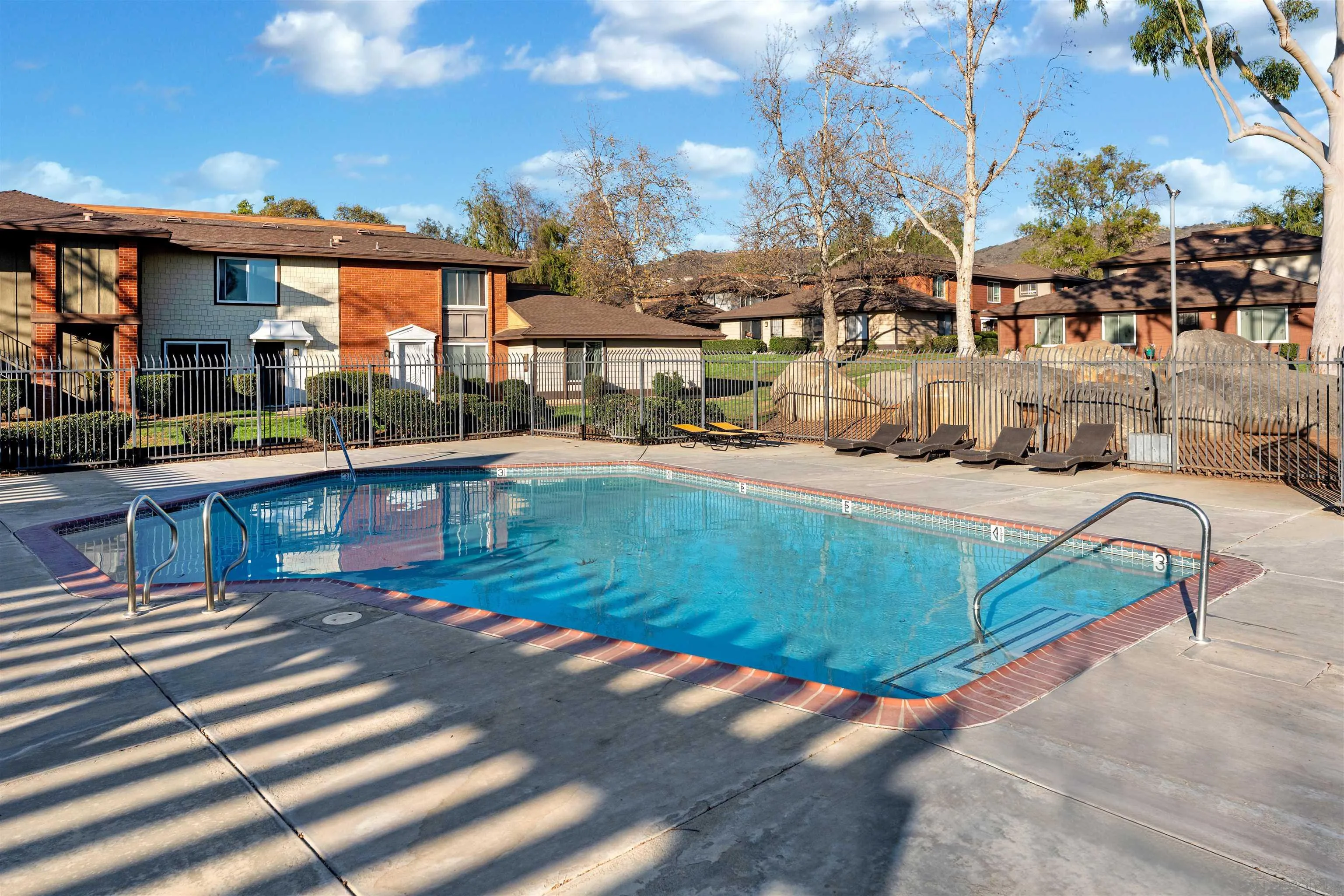 1622 Summertime Drive El Cajon, CA 92021 - Photo 25 of 27 a view of a patio with swimming pool table and chairs