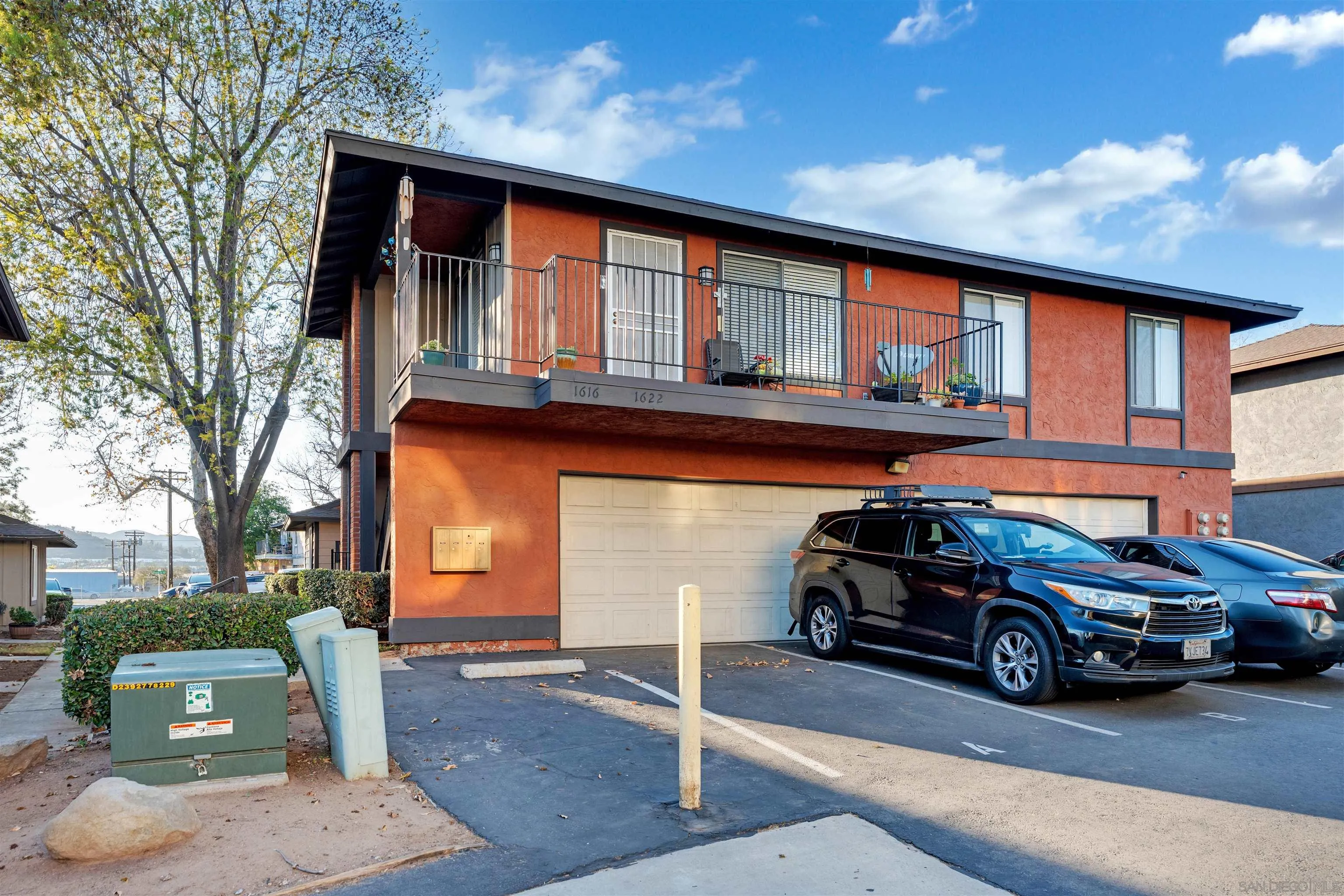 1622 Summertime Drive El Cajon, CA 92021 - Photo 27 of 27 a car parked in front of a house