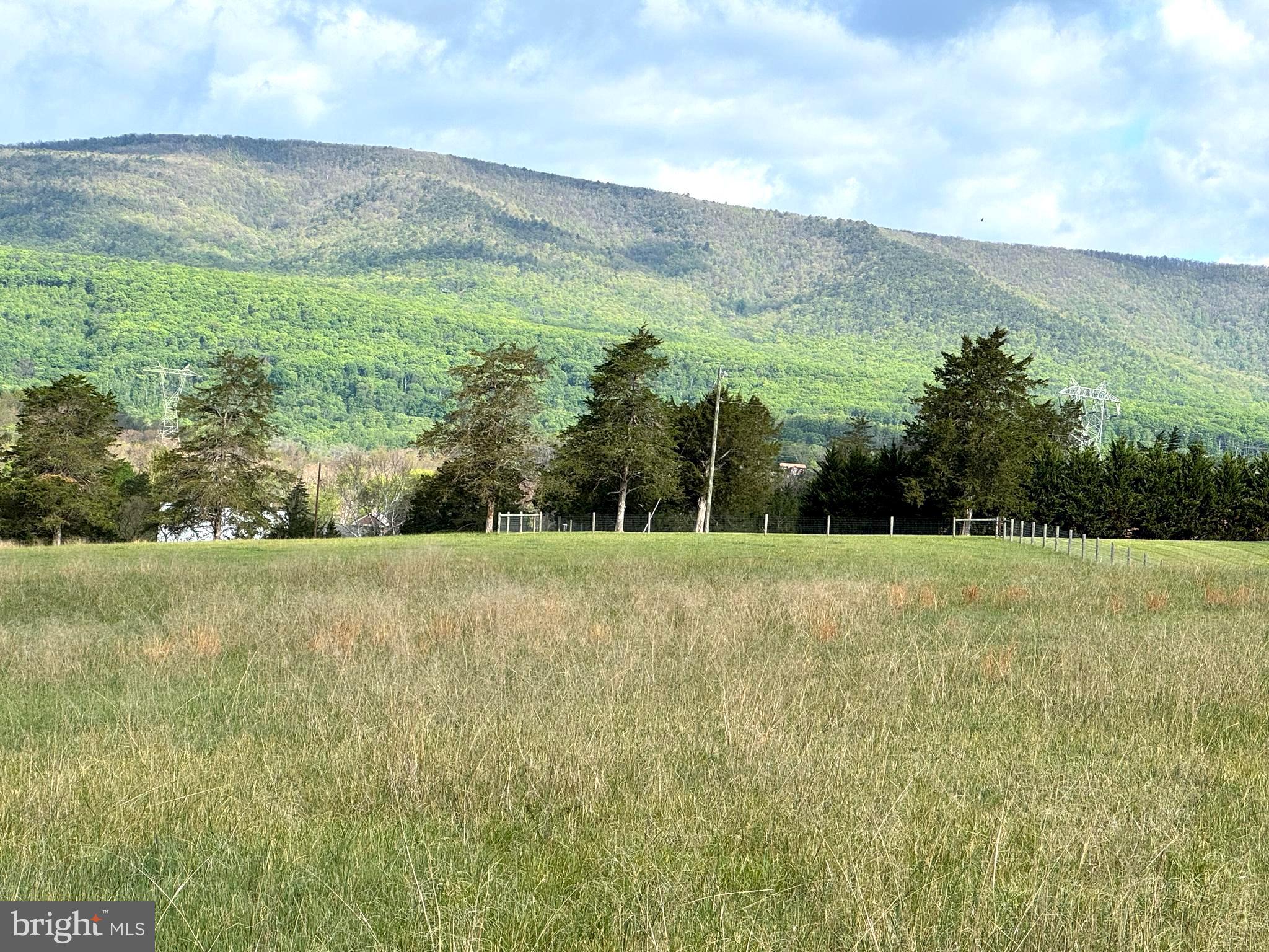 7.4 Mountain Falls Road Winchester, VA 22602 - Photo 2 of 15 a view of a field with an ocean