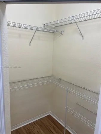 a view of a room with racks on the wall