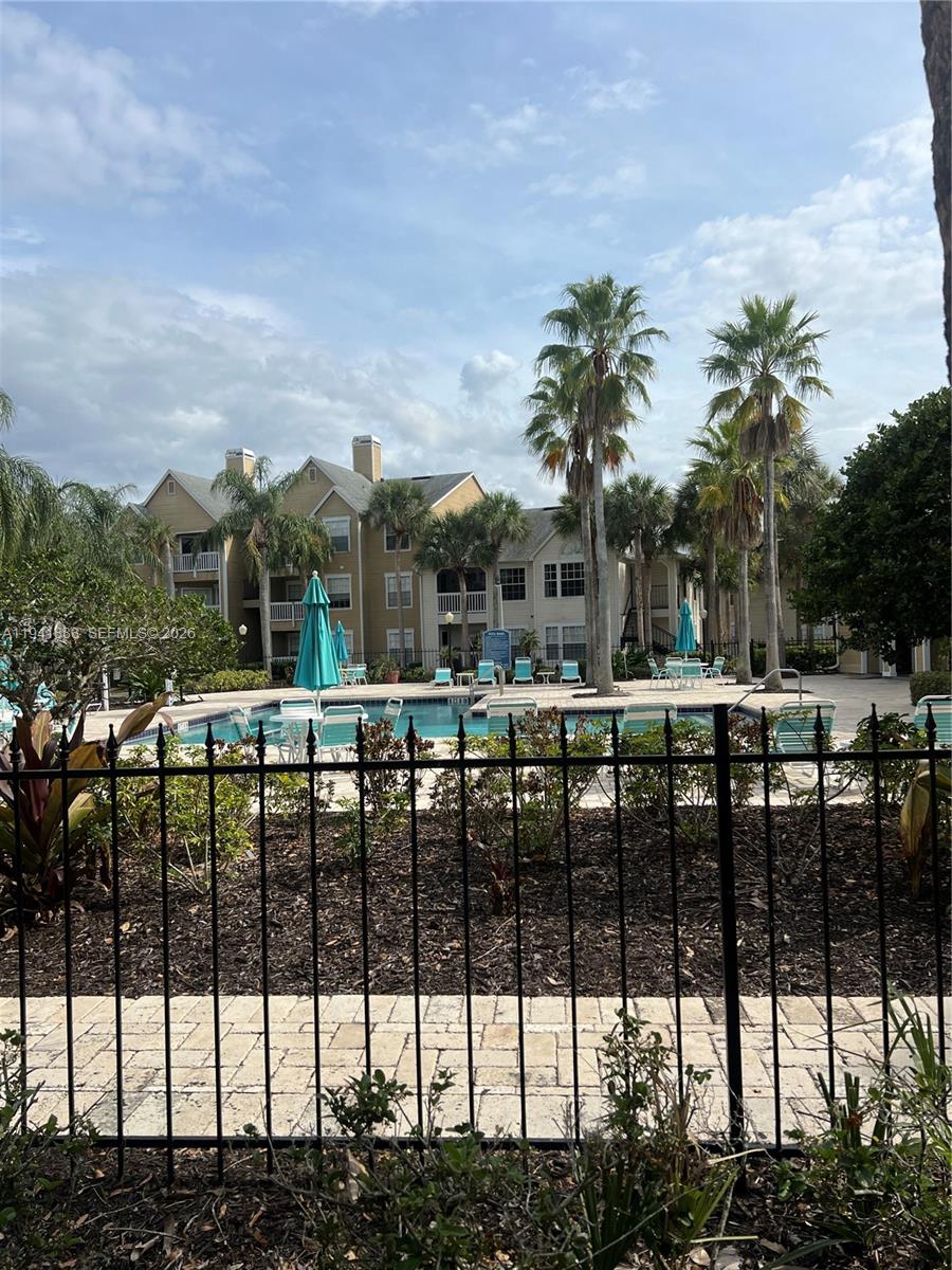 1055 South Hiawassee Road, Unit 2014 Orlando, FL 32835 - Photo 8 of 22 a view of staircase and city view