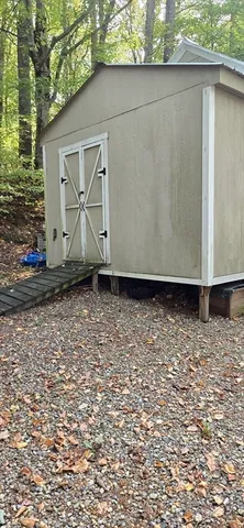 a view of swimming pool and outdoor seating