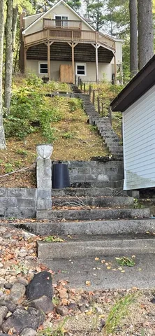 a view of a door with wooden floor