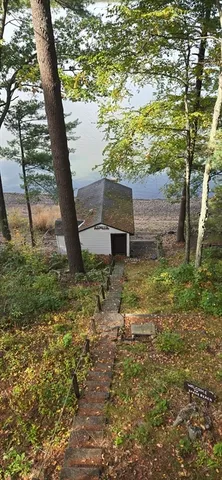 a view of a balcony with chairs
