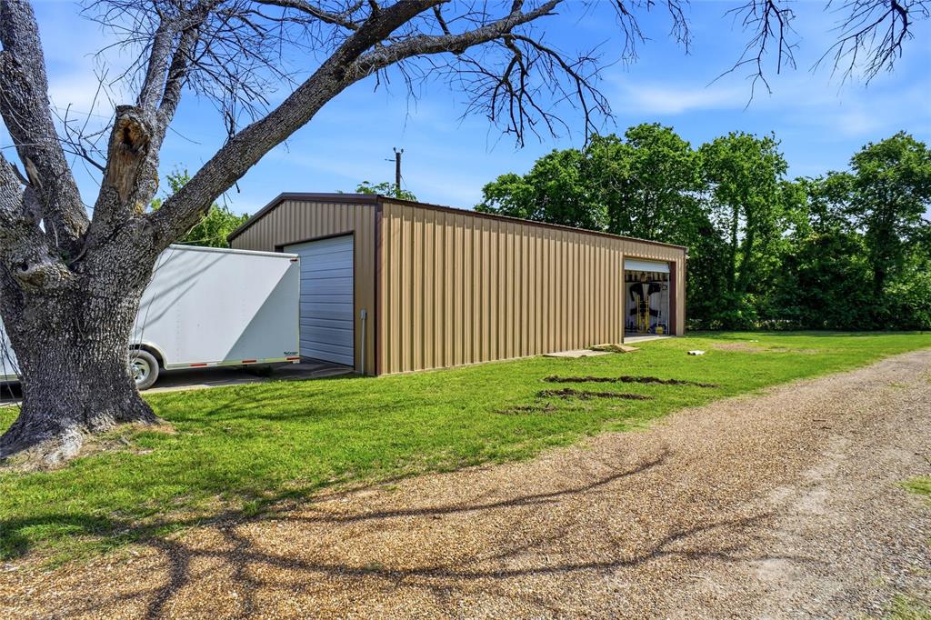 8983 Odneal Road West Krum, TX 76249 - Photo 22 of 29 This is a Southwest Metal Systems building. Workshop is a few steps from the Main home(house #1).