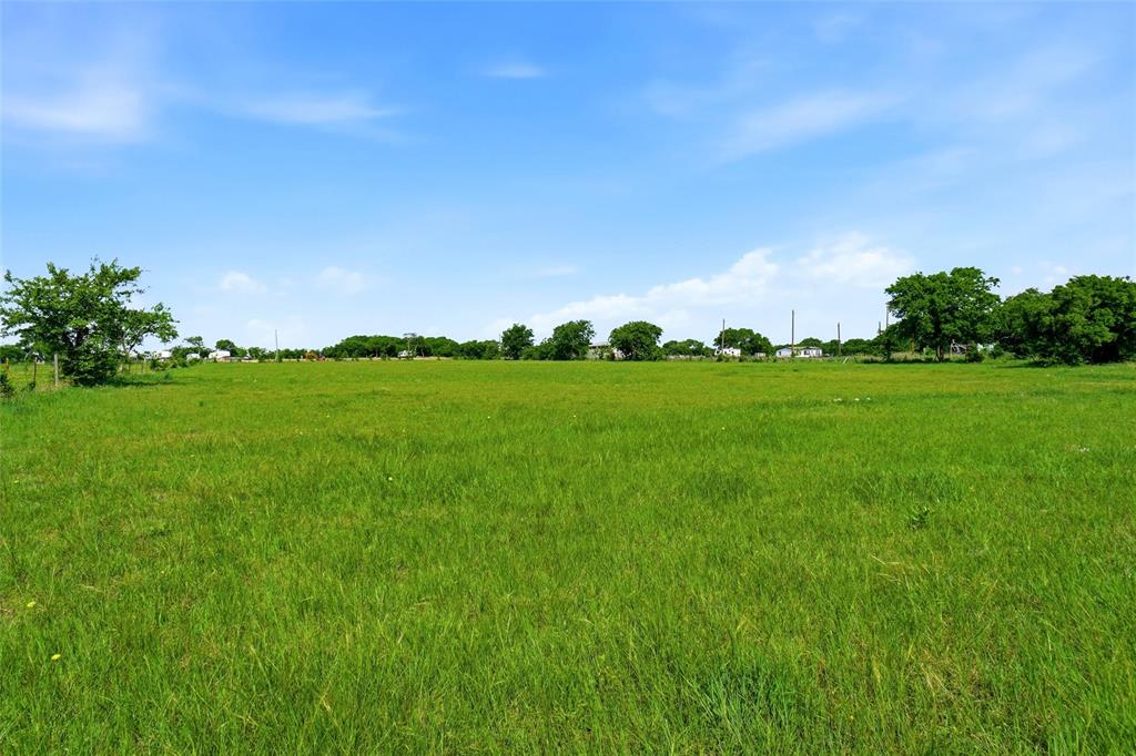 8983 Odneal Road West Krum, TX 76249 - Photo 25 of 29 Bring your animals. This pasture grass is good grazing. There are three sides with barbed wire with a hot wire across the front. Fencing may need to be added,depending on the animals.