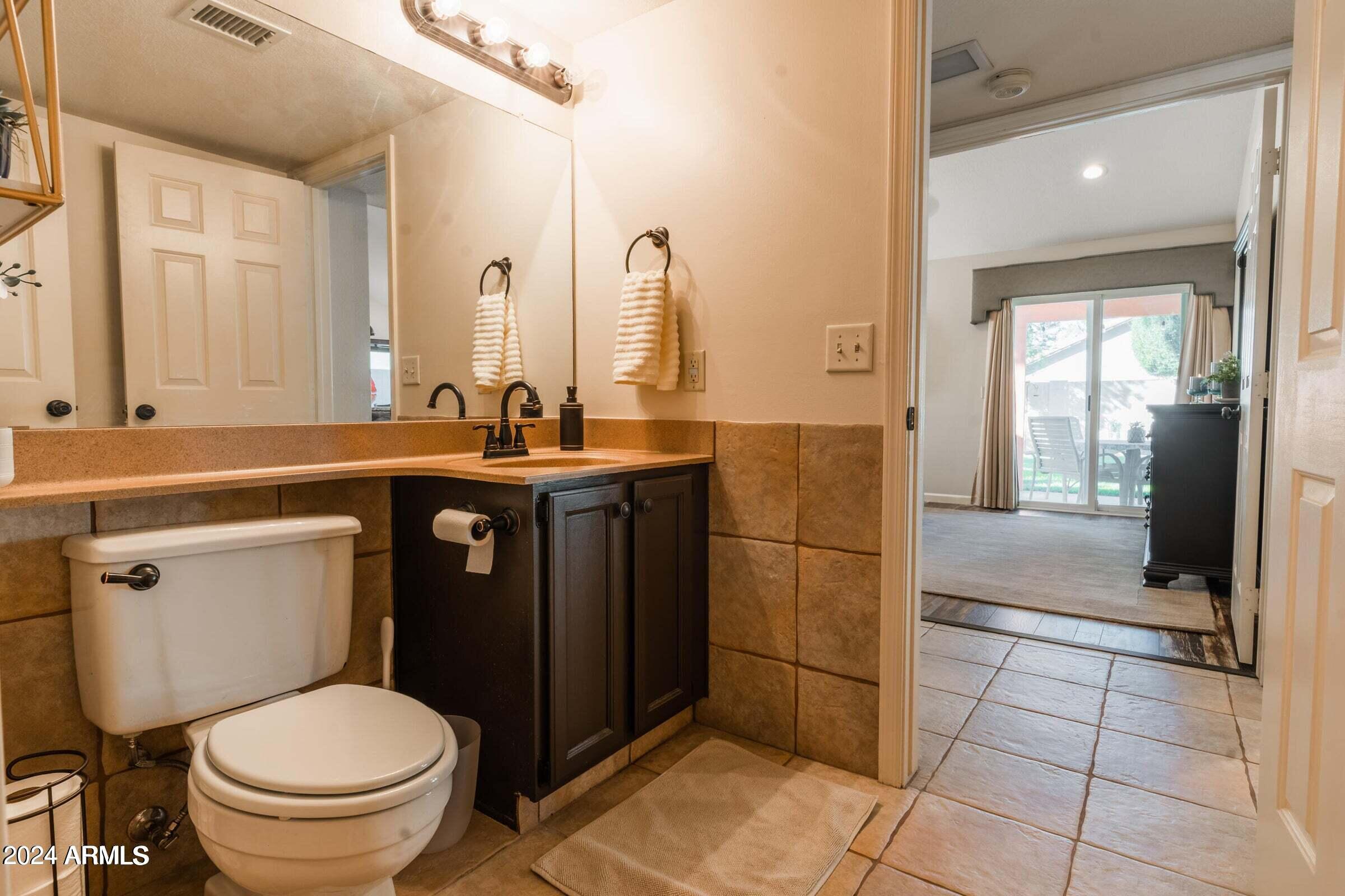 2322 East Millbrae Court Gilbert, AZ 85234 - Photo 34 of 38 Half bath off family room