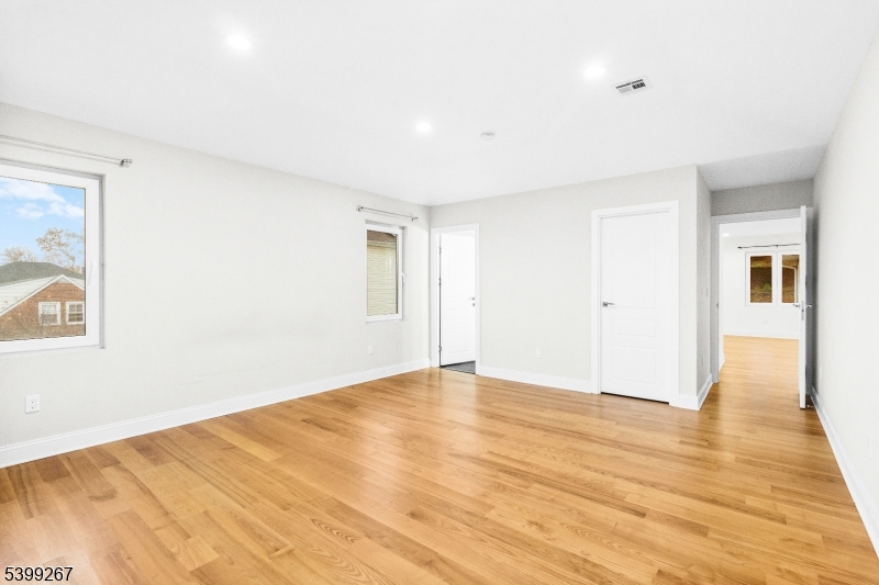 71 St Marys Place, Unit 2 Nutley, NJ 07110 - Photo 23 of 45 a view of an empty room with wooden floor