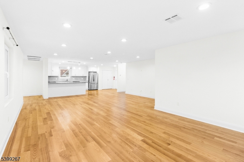 71 St Marys Place, Unit 2 Nutley, NJ 07110 - Photo 30 of 45 a view of empty room with wooden floor