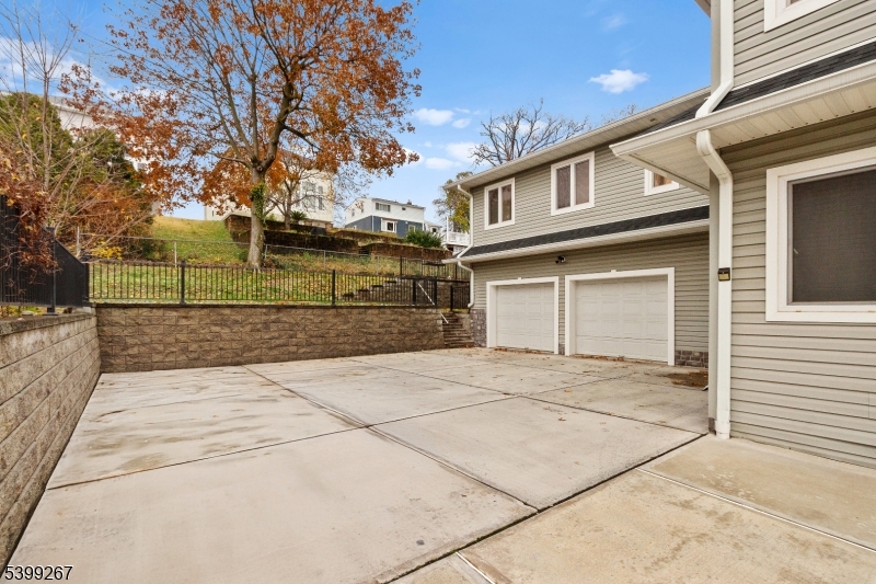 71 St Marys Place, Unit 2 Nutley, NJ 07110 - Photo 33 of 45 a front view of a house with a yard