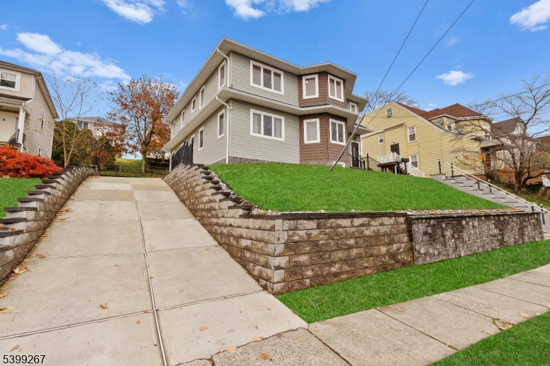 71 St Marys Place, Unit 2 Nutley, NJ 07110 - Photo 34 of 45 a front view of a house with garden