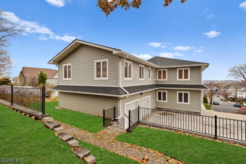 71 St Marys Place, Unit 2 Nutley, NJ 07110 - Photo 41 of 45 a front view of a house with garden