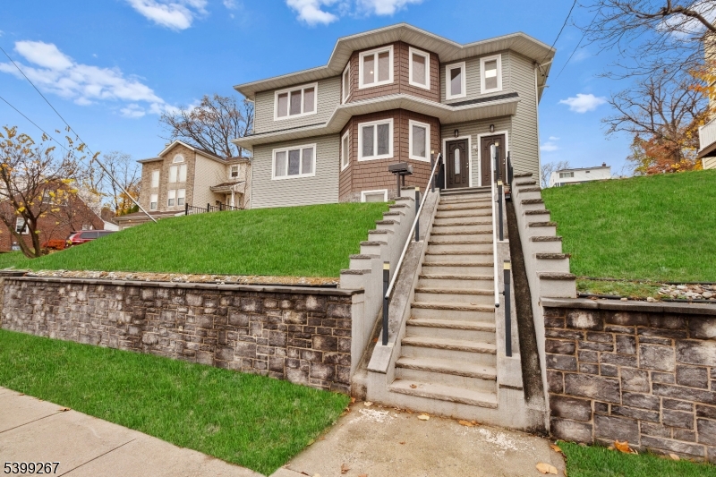 71 St Marys Place, Unit 2 Nutley, NJ 07110 - Photo 45 of 45 a front view of a house with a yard