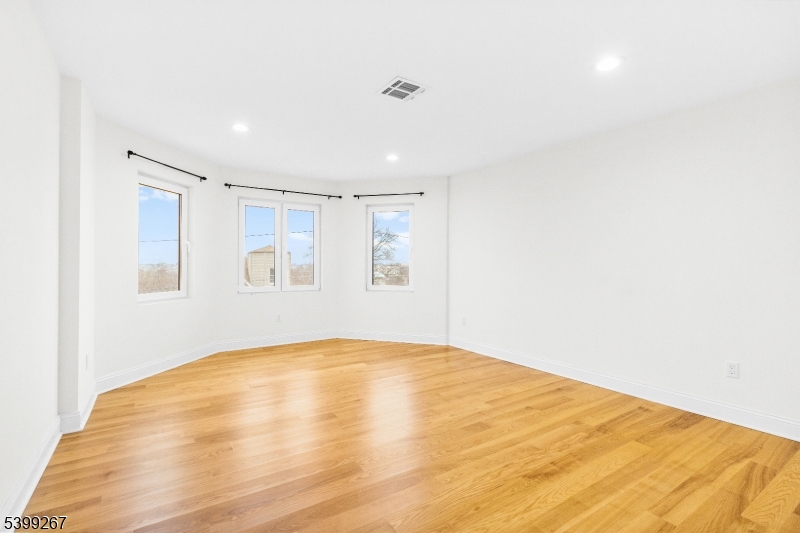 71 St Marys Place, Unit 2 Nutley, NJ 07110 - Photo 8 of 45 a view of empty room with wooden floor