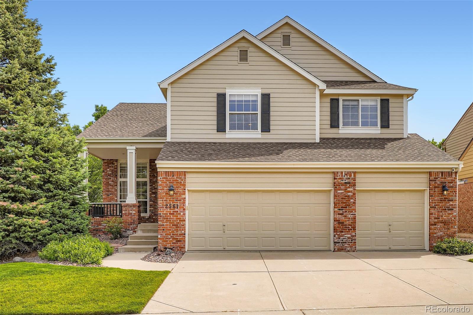 2561 Cactus Bluff Place Highlands Ranch, CO 80129 - Photo 3 of 33 a view of house with garage
