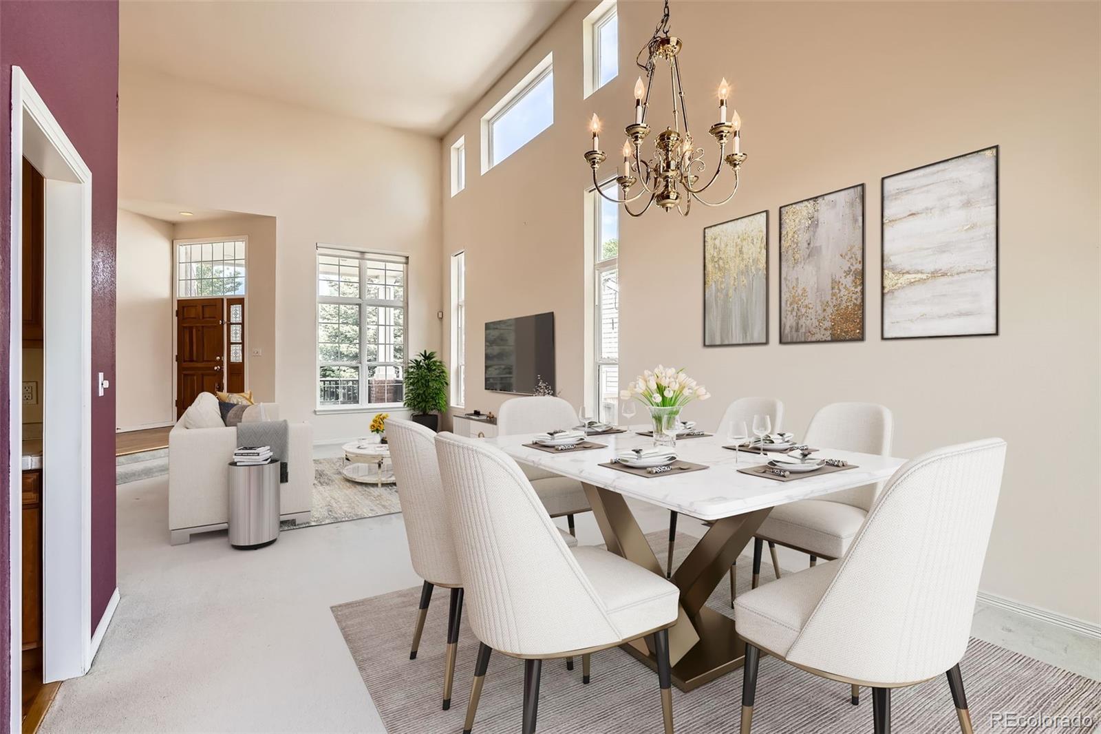 2561 Cactus Bluff Place Highlands Ranch, CO 80129 - Photo 6 of 33 a view of a dining room with furniture a chandelier and wooden floor