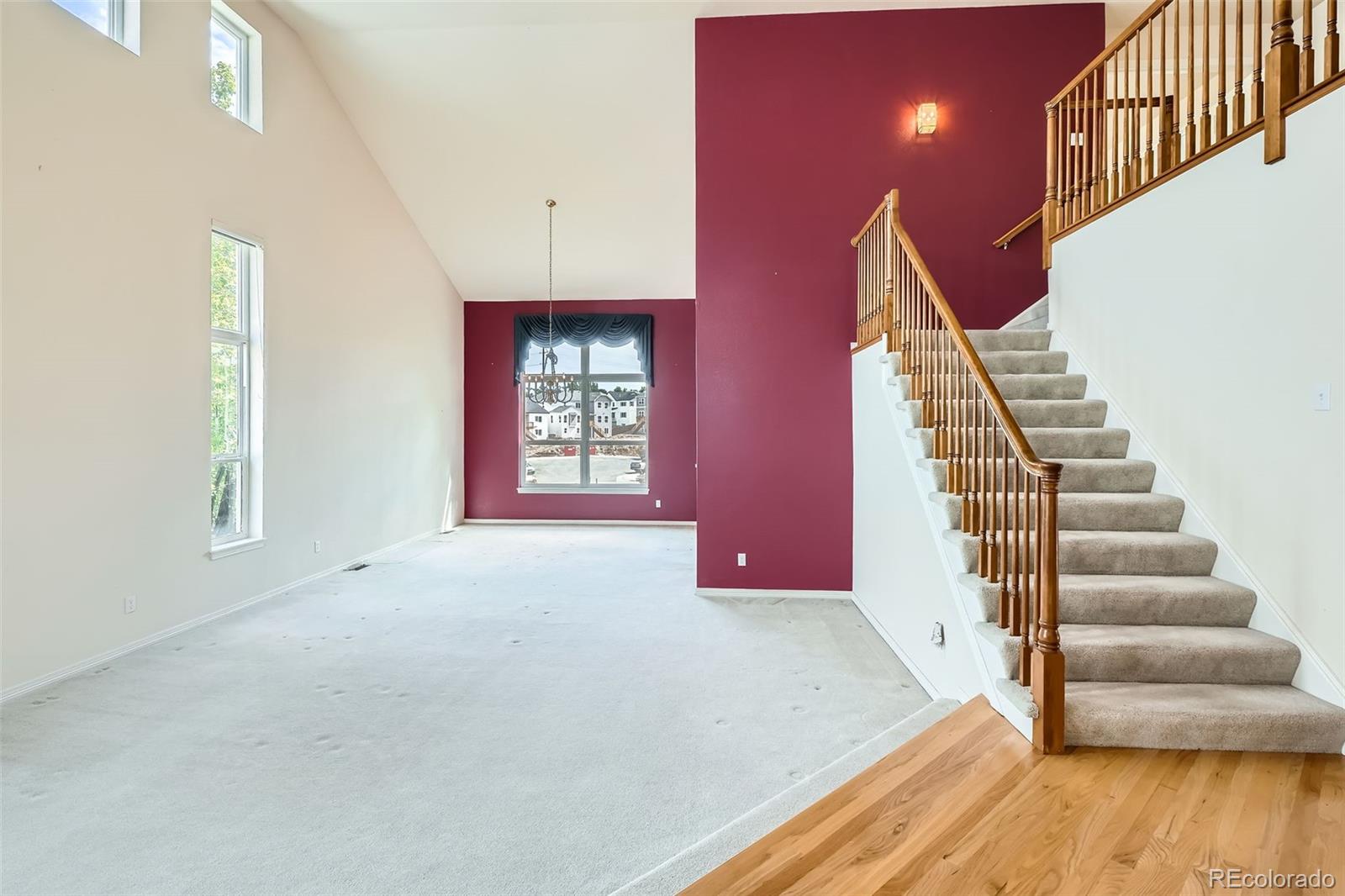2561 Cactus Bluff Place Highlands Ranch, CO 80129 - Photo 7 of 33 a view of entryway and hall with wooden floor