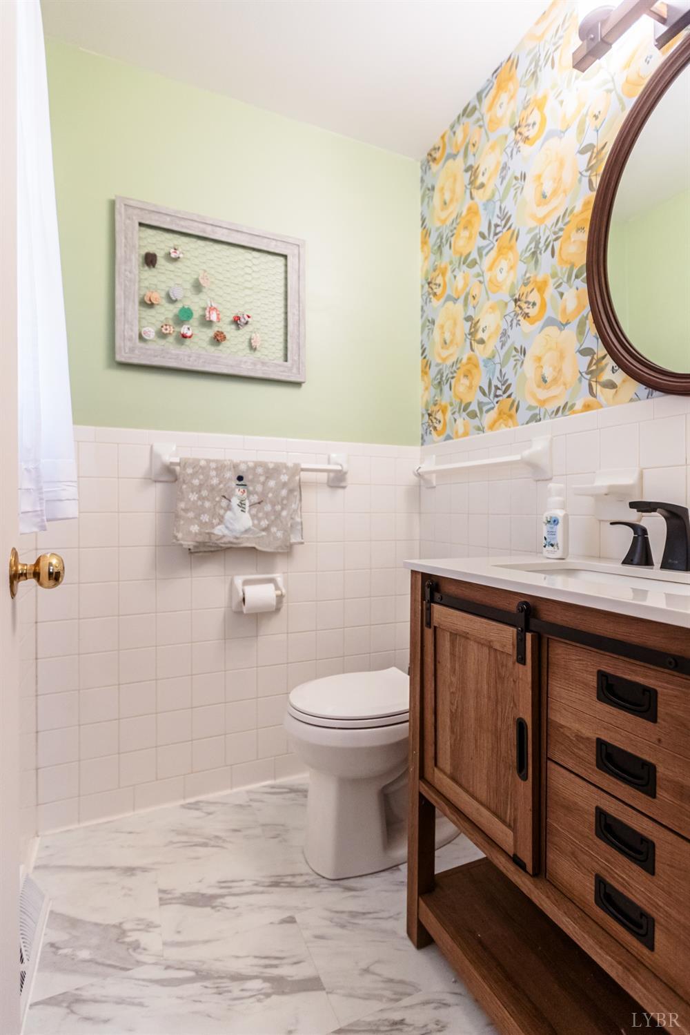 10769 Oakville Road Gladstone, VA 24553 - Photo 15 of 35 a bathroom with a toilet and a sink
