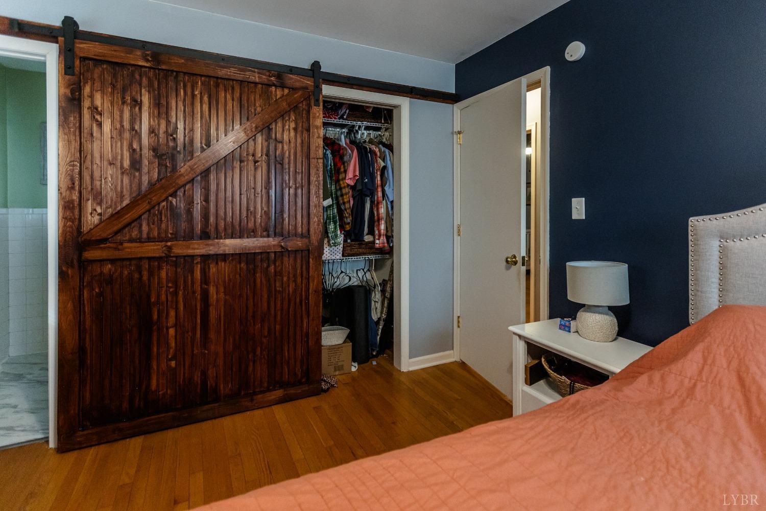 10769 Oakville Road Gladstone, VA 24553 - Photo 17 of 35 a bedroom with furniture and a closet