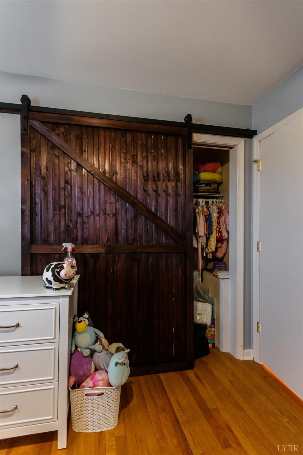 10769 Oakville Road Gladstone, VA 24553 - Photo 20 of 35 a bedroom with a bed and a window