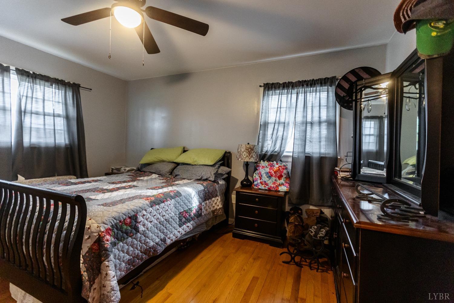 10769 Oakville Road Gladstone, VA 24553 - Photo 21 of 35 a bedroom with bed and window