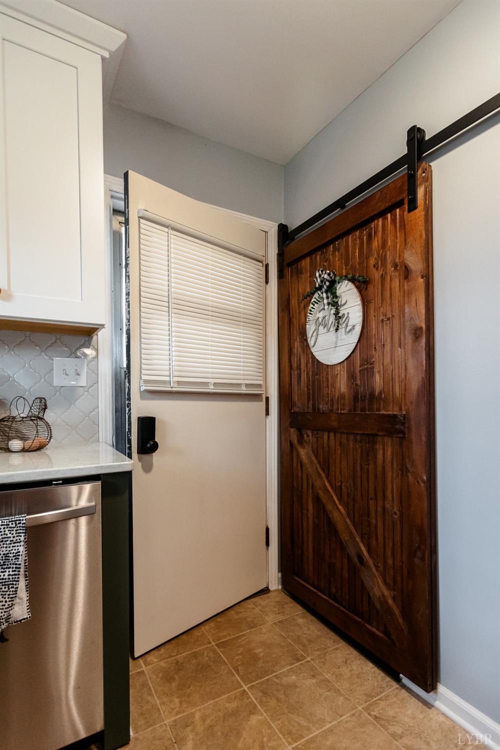 10769 Oakville Road Gladstone, VA 24553 - Photo 22 of 35 a view of an empty room and wooden floor