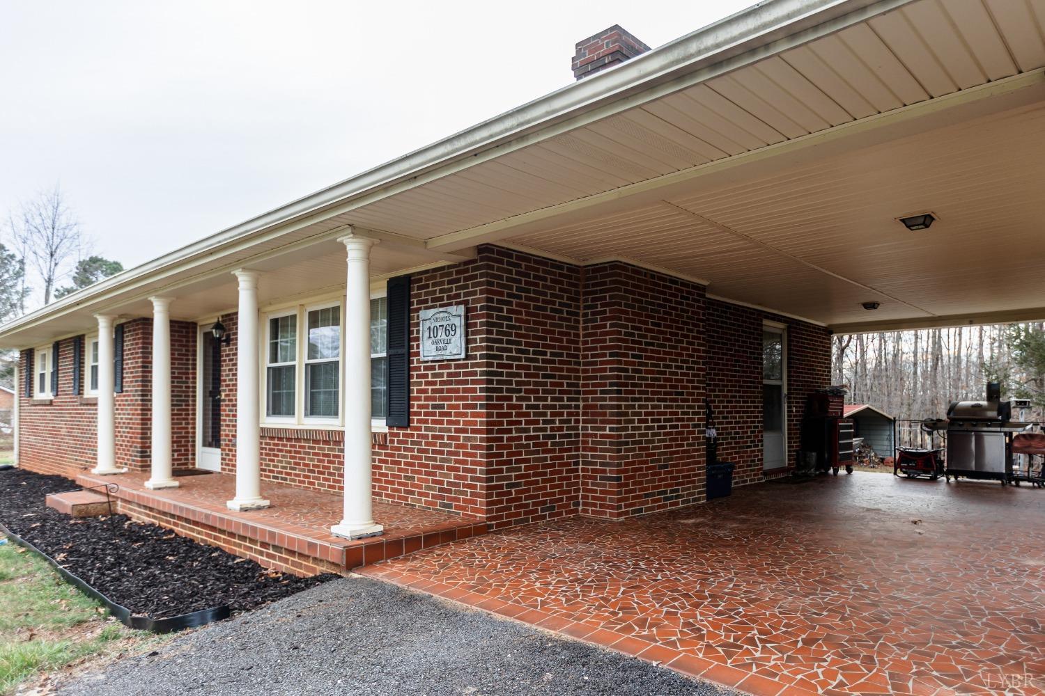10769 Oakville Road Gladstone, VA 24553 - Photo 3 of 35 a view of a house with many windows