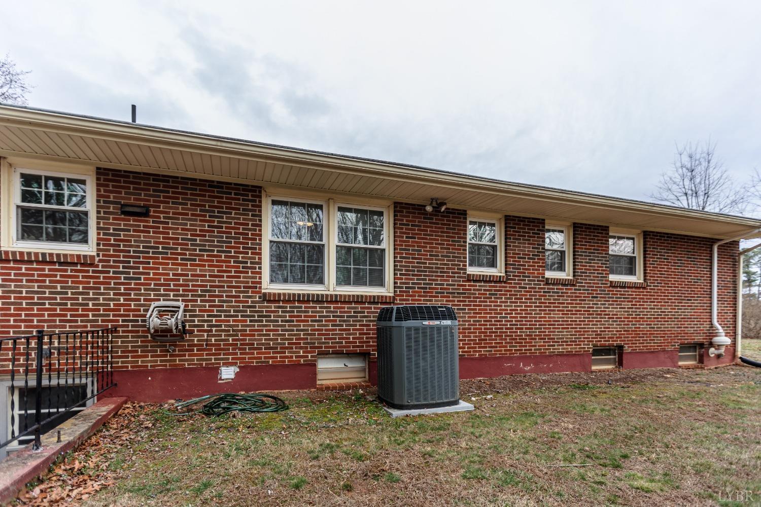 10769 Oakville Road Gladstone, VA 24553 - Photo 31 of 35 a front view of a house with plants
