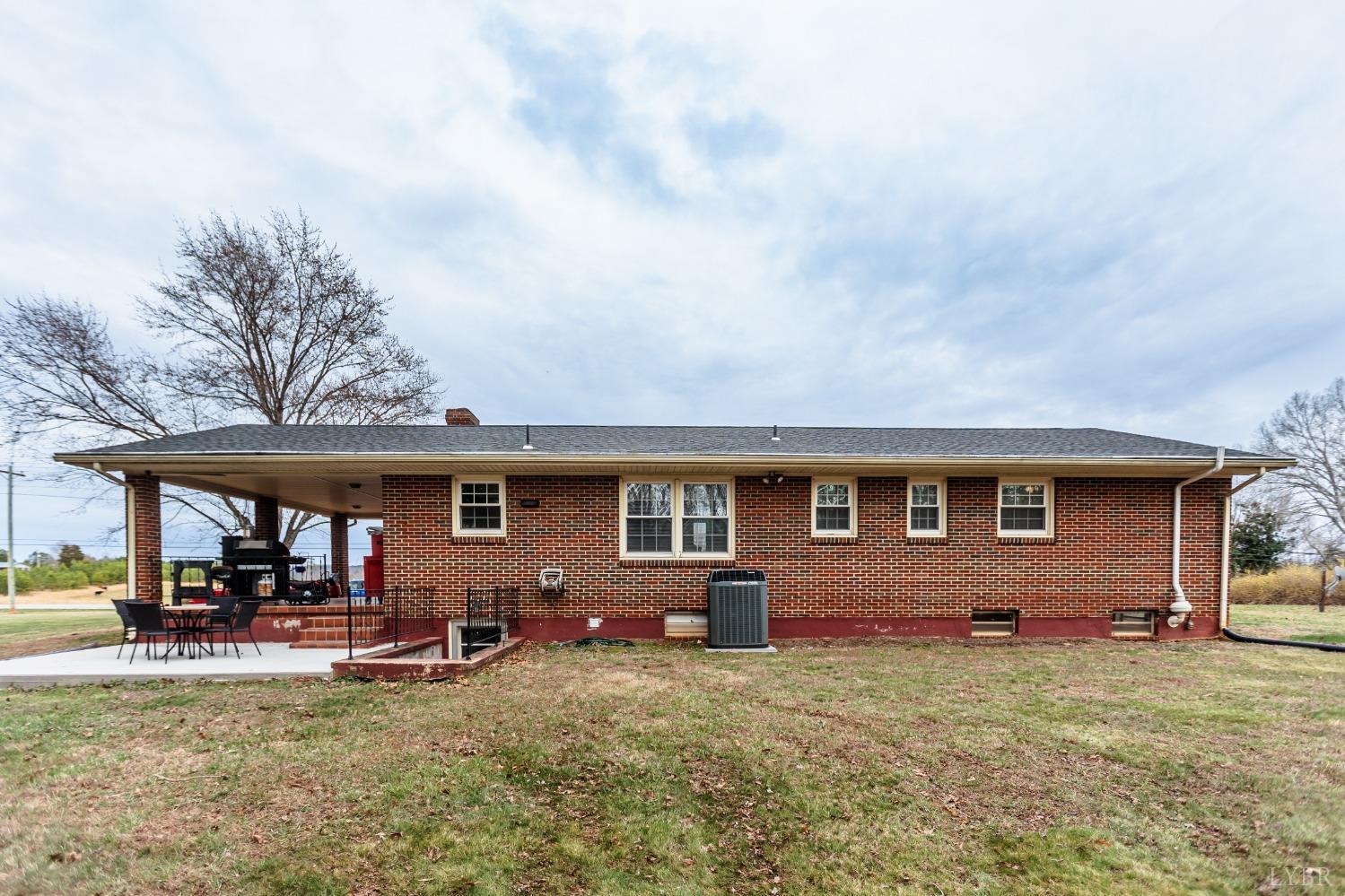 10769 Oakville Road Gladstone, VA 24553 - Photo 33 of 35 a view of a house with a patio