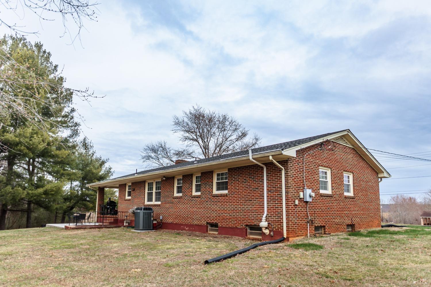 10769 Oakville Road Gladstone, VA 24553 - Photo 34 of 35 a view of house with a big yard