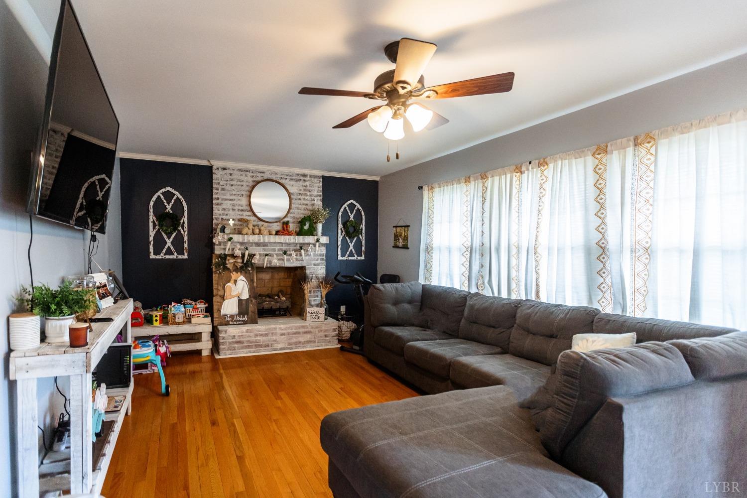 10769 Oakville Road Gladstone, VA 24553 - Photo 6 of 35 a living room with furniture and a large window