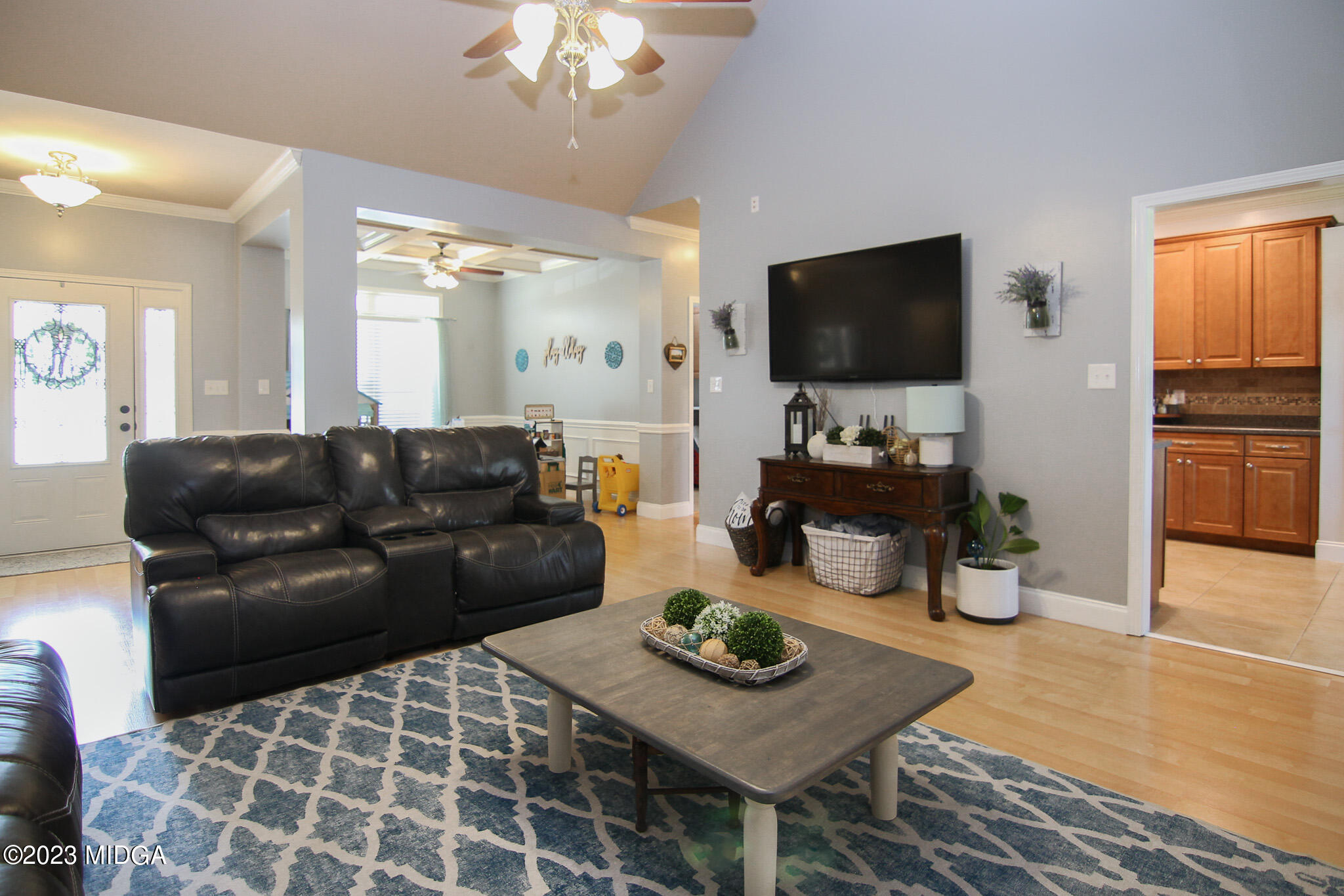 110 Berkley Circle Warner Robins, GA 31093 - Photo 11 of 57 a living room with furniture and a flat screen tv