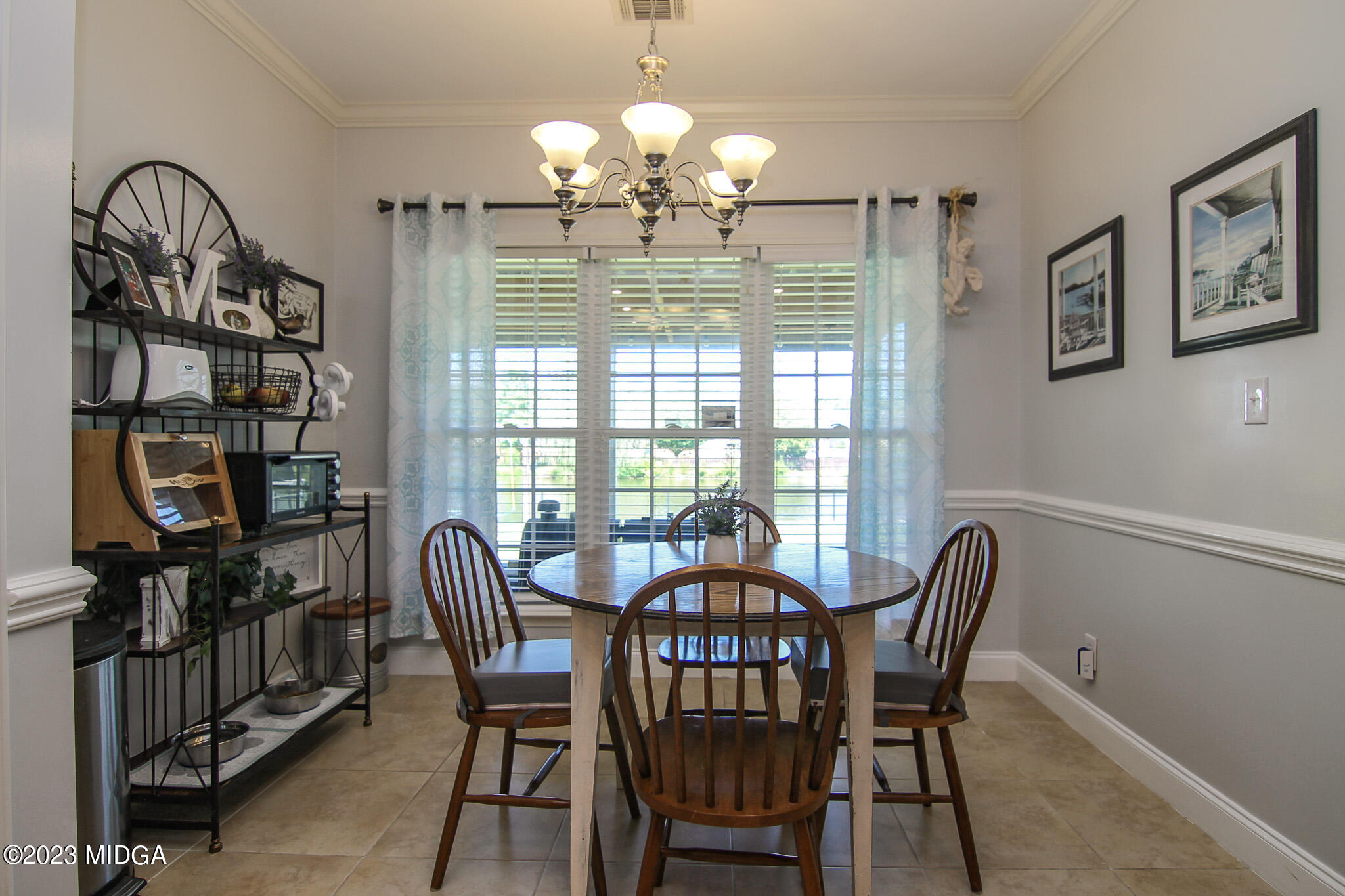 110 Berkley Circle Warner Robins, GA 31093 - Photo 14 of 57 a view of a dining room with furniture and chandelier