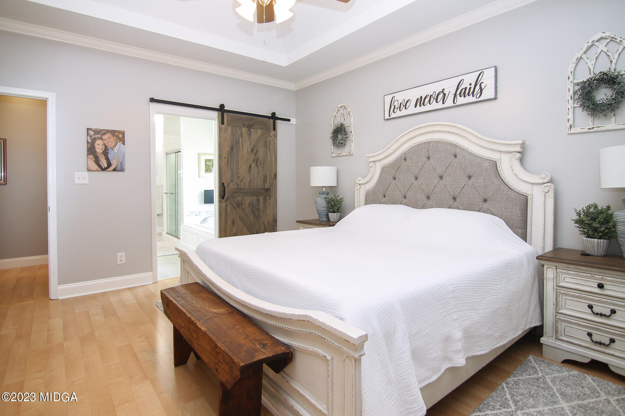 110 Berkley Circle Warner Robins, GA 31093 - Photo 21 of 57 a spacious bedroom with a bed and a dresser