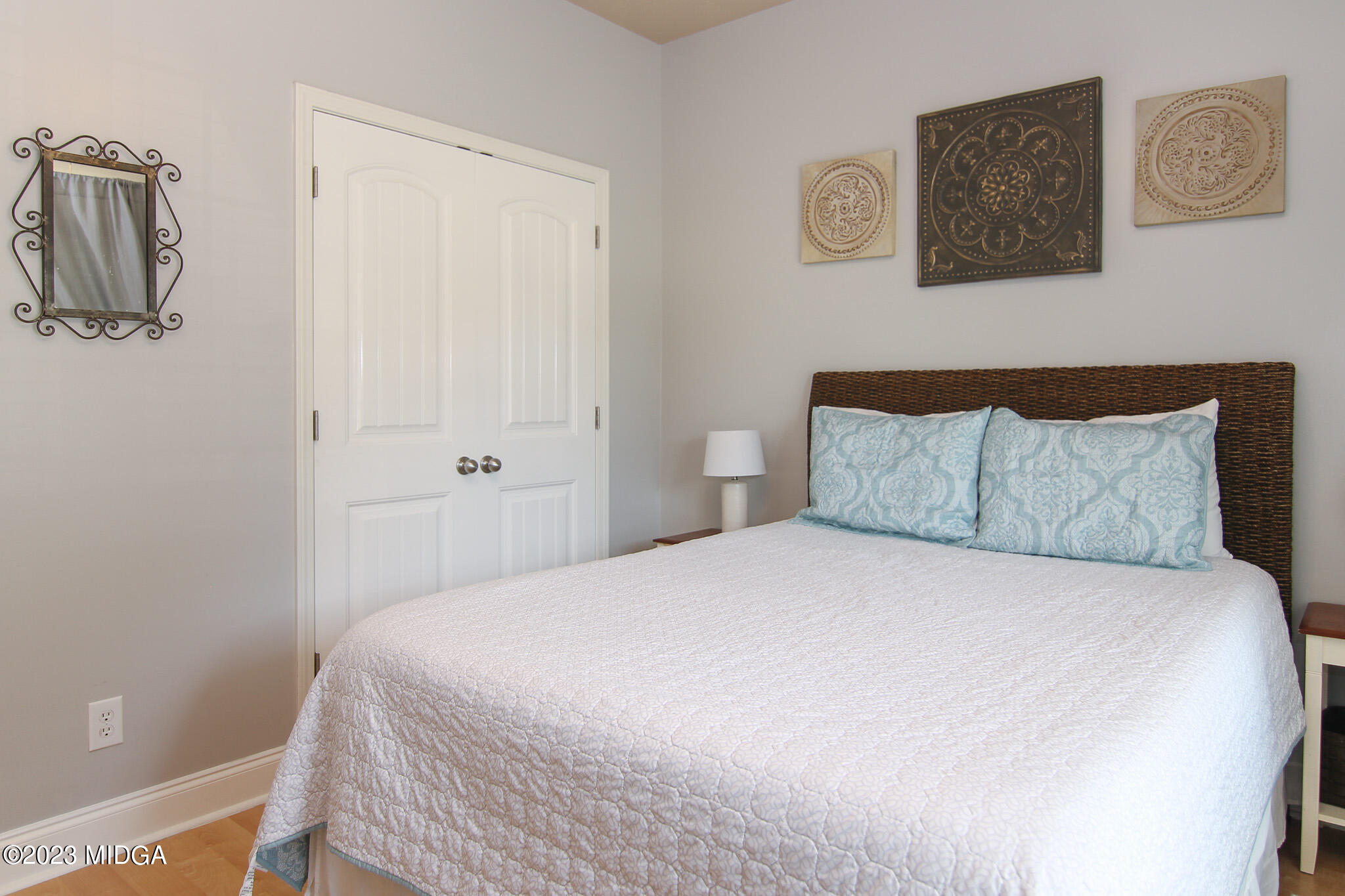 110 Berkley Circle Warner Robins, GA 31093 - Photo 29 of 57 a bedroom with a bed and wall painting
