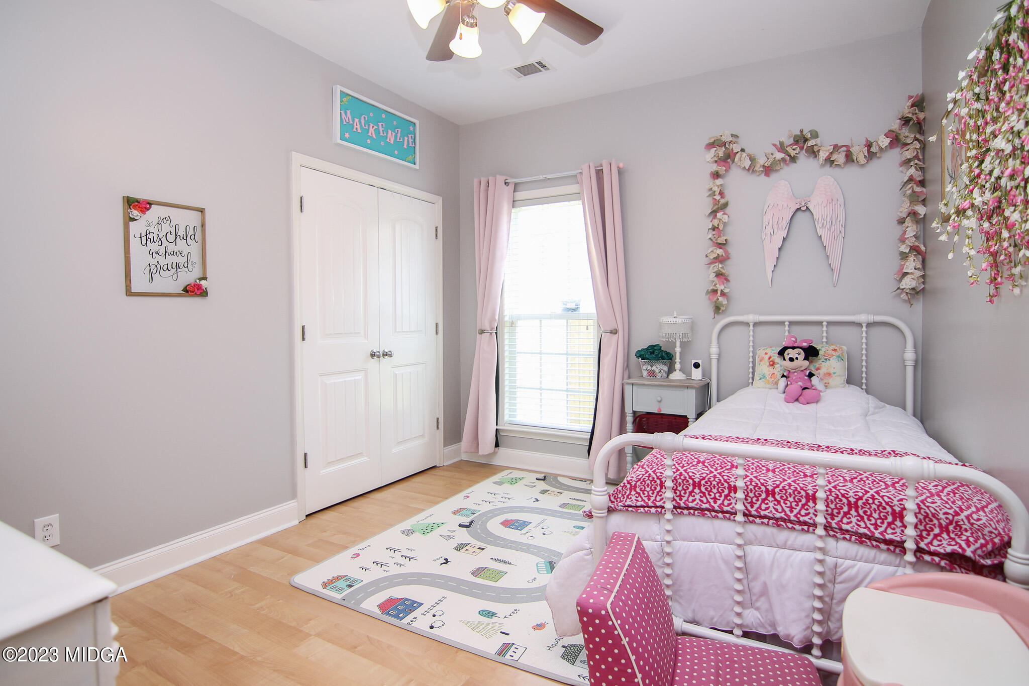 110 Berkley Circle Warner Robins, GA 31093 - Photo 32 of 57 a bedroom with a bed and a chandelier