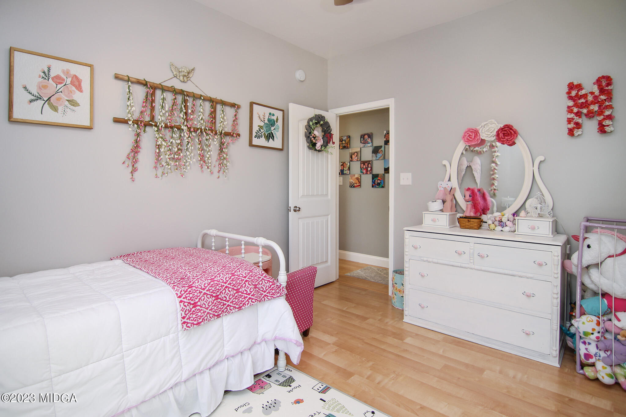 110 Berkley Circle Warner Robins, GA 31093 - Photo 34 of 57 a bedroom with a bed and cabinets