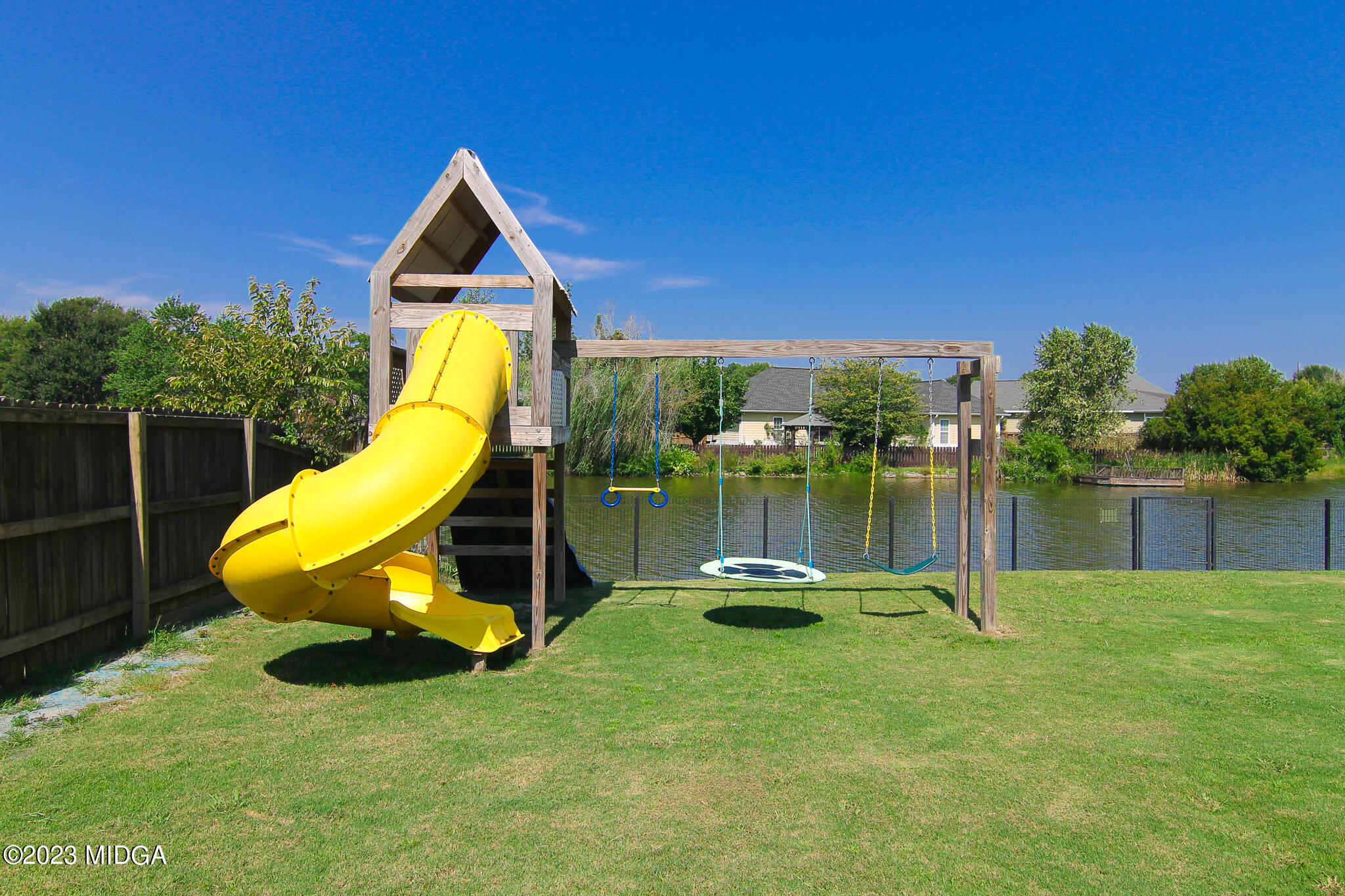 110 Berkley Circle Warner Robins, GA 31093 - Photo 45 of 57 a swimming pool with a slide and bench