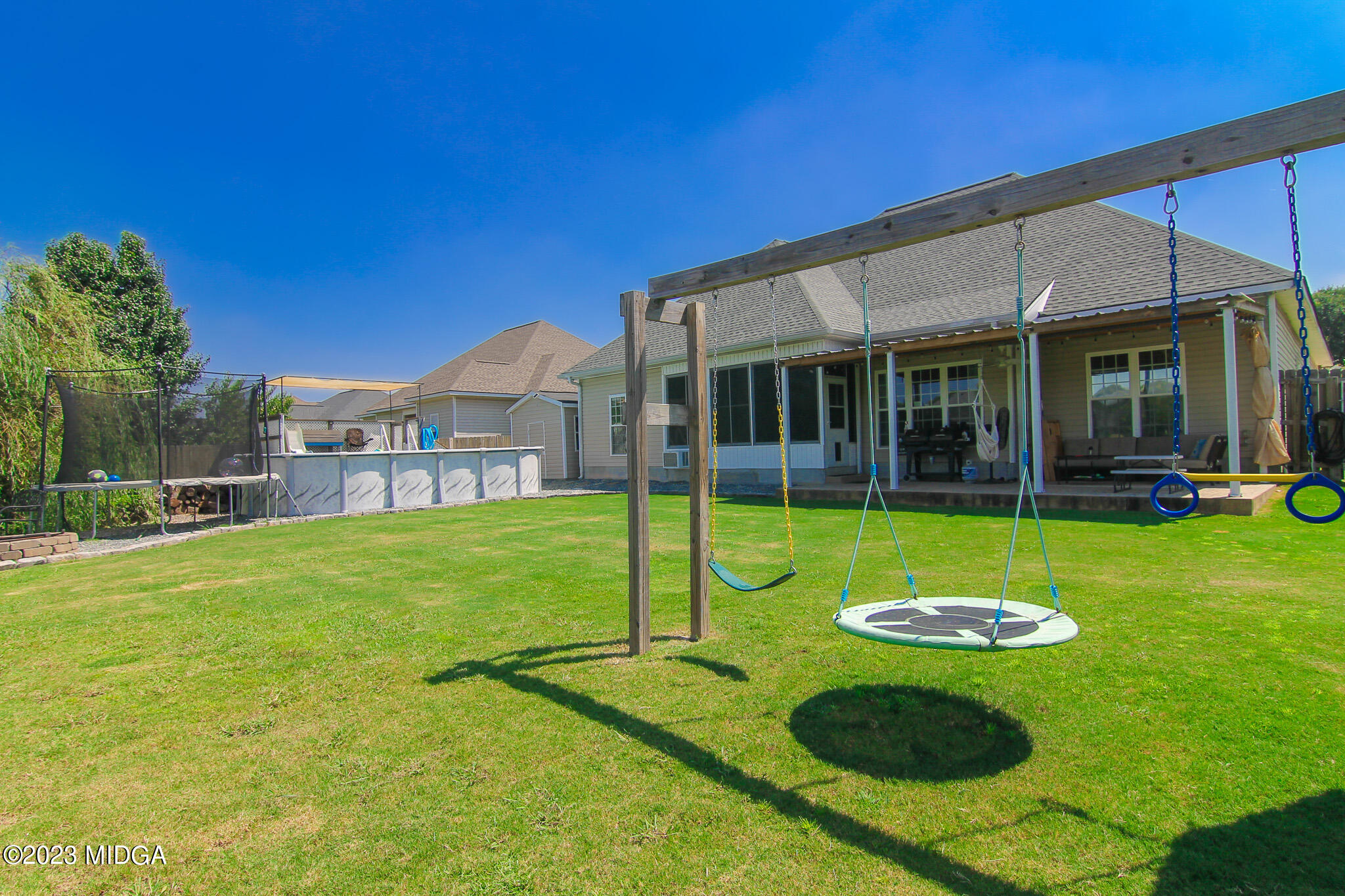 110 Berkley Circle Warner Robins, GA 31093 - Photo 55 of 57 a view of a house with a backyard porch and sitting area
