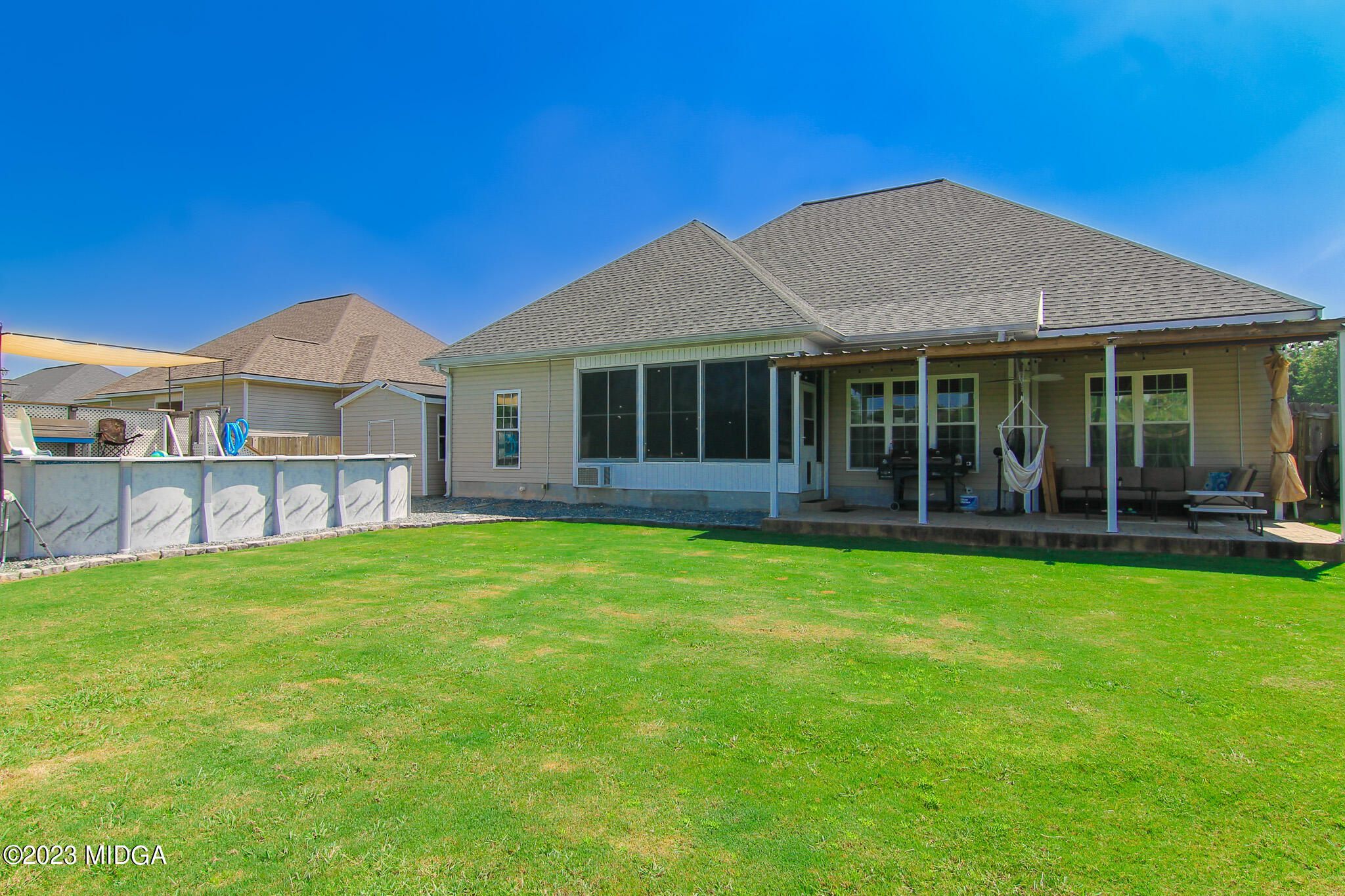 110 Berkley Circle Warner Robins, GA 31093 - Photo 56 of 57 a front view of a house with a garden
