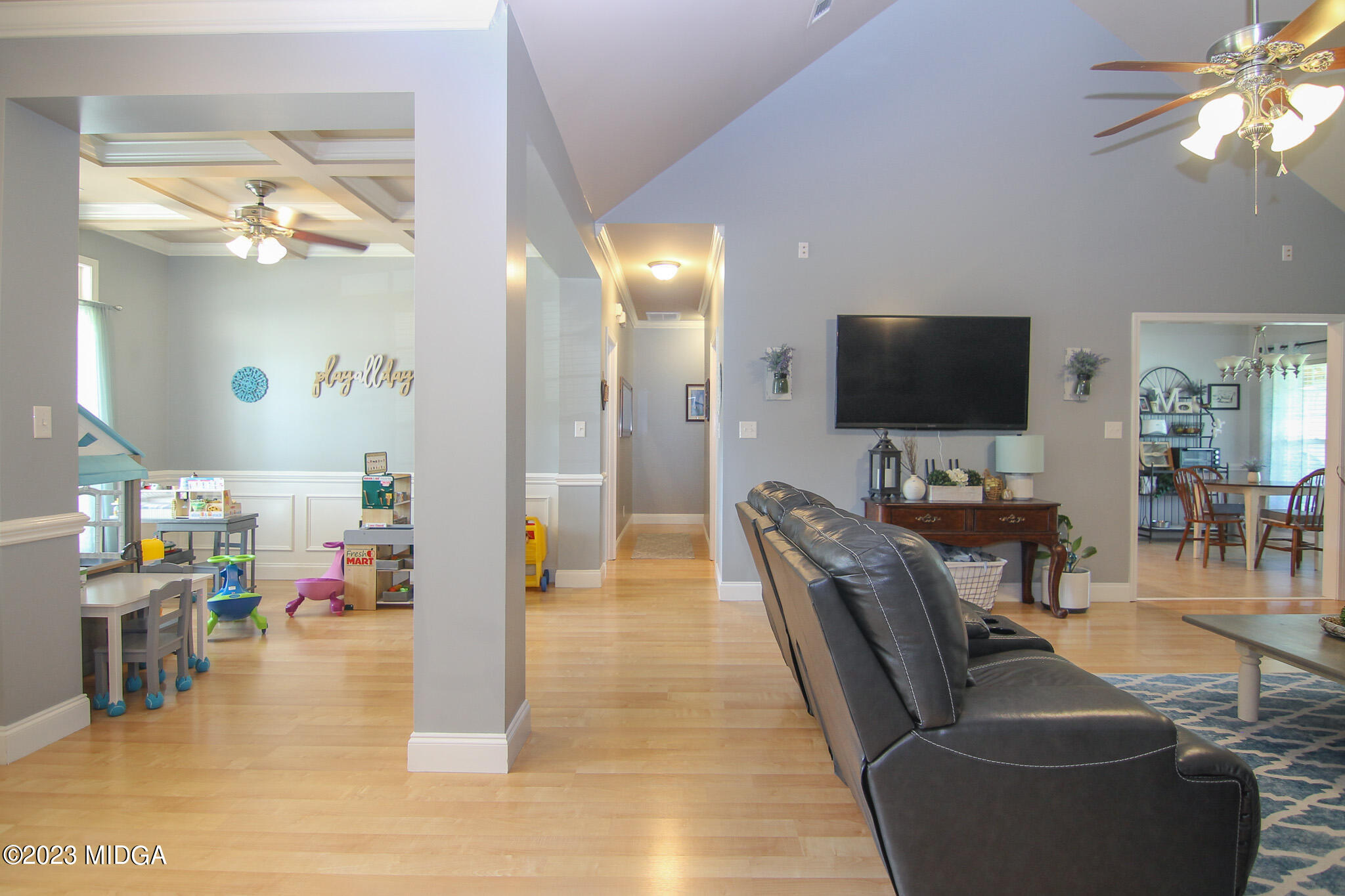 110 Berkley Circle Warner Robins, GA 31093 - Photo 8 of 57 a living room with furniture and a flat screen tv