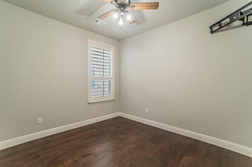 3503 Jersey Road Melissa, TX 75454 - Photo 14 of 40 Empty room featuring dark wood-type flooring and ceiling fan