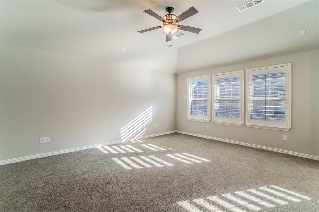 3503 Jersey Road Melissa, TX 75454 - Photo 33 of 40 Unfurnished room with carpet, lofted ceiling, and a ceiling fan
