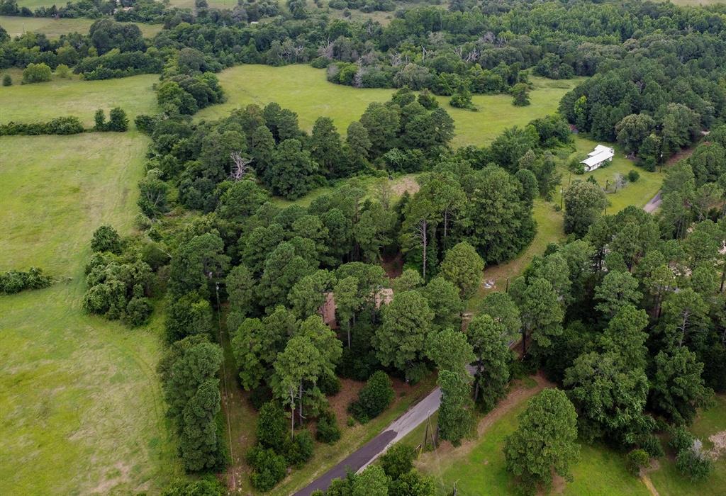1032 B County Road 2309 Canton, TX 75103 - Photo 2 of 4 an aerial view of residential houses with outdoor space and trees