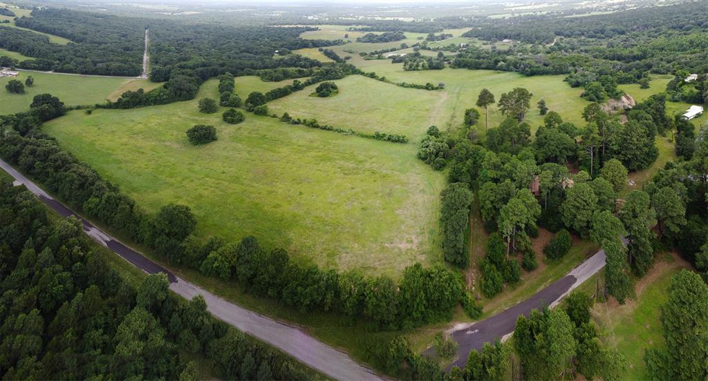 1032 B County Road 2309 Canton, TX 75103 - Photo 3 of 4 a view of a lake with a yard