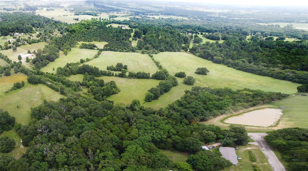 1032 B County Road 2309 Canton, TX 75103 - Photo 4 of 4 an aerial view of a house with a yard