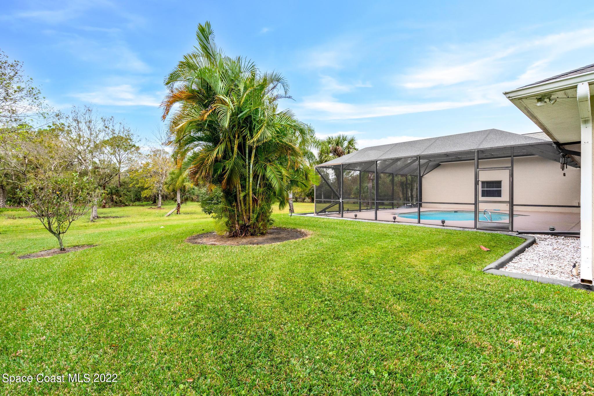 3970 Harlock Road Melbourne, FL 32934 - Photo 22 of 30 a view of a backyard