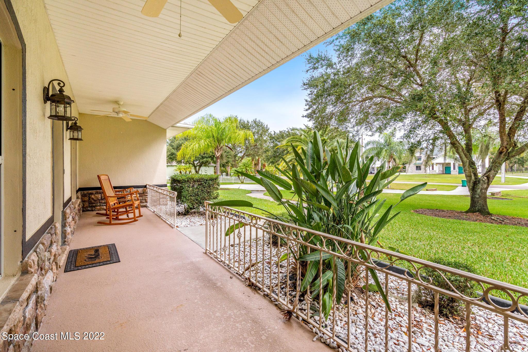 3970 Harlock Road Melbourne, FL 32934 - Photo 4 of 30 a view of a balcony with chairs